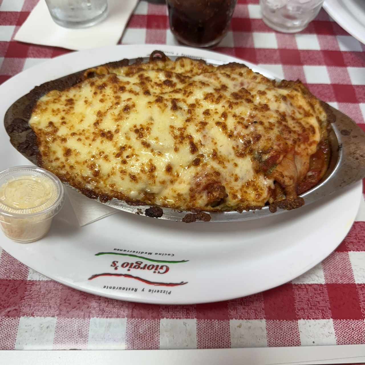 Spaghetti de Pernil Gratinado en Salsa Pomodoro