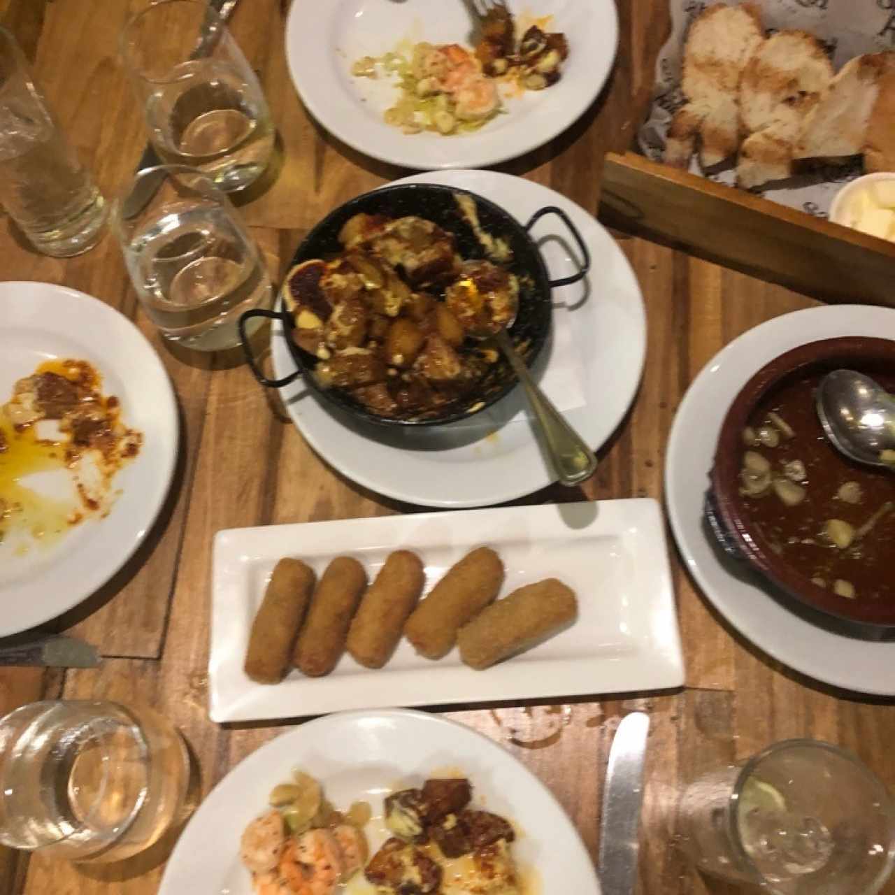 potatoes, croquettes, empty shrimp dish
