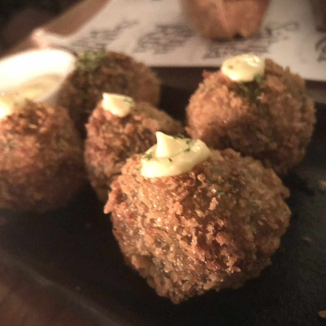 Croquetas de pulpo en tinta de calamar