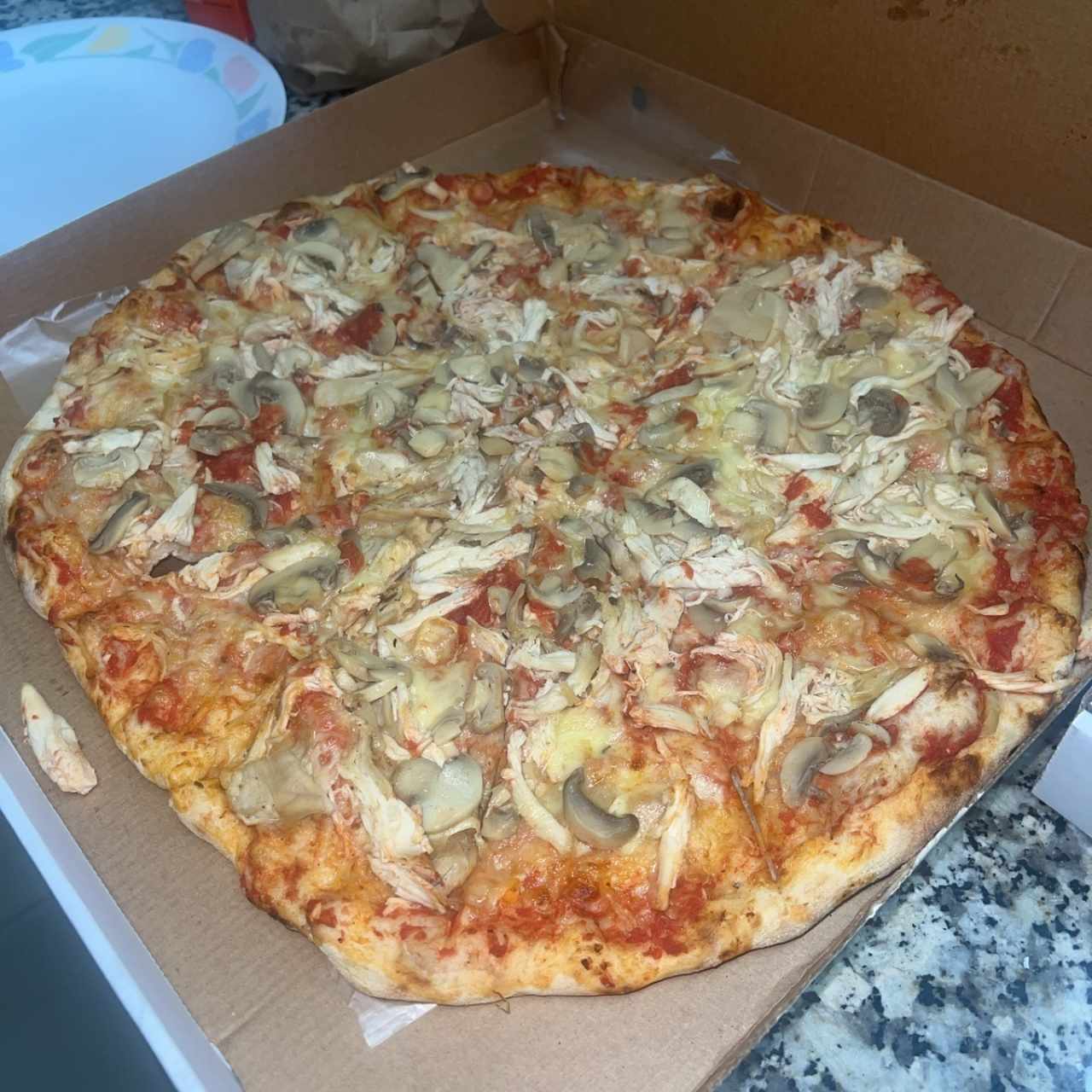 Pizza de pollo con hongos