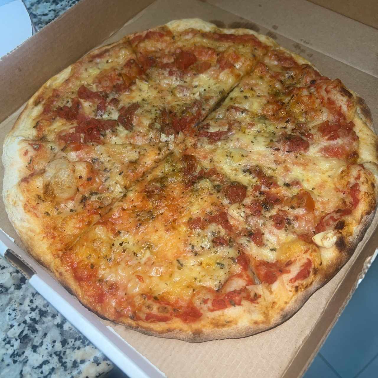 Pizza marinara con queso