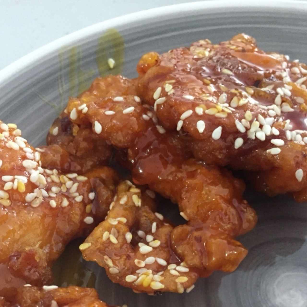 Pollo con miel y ajonjoli 