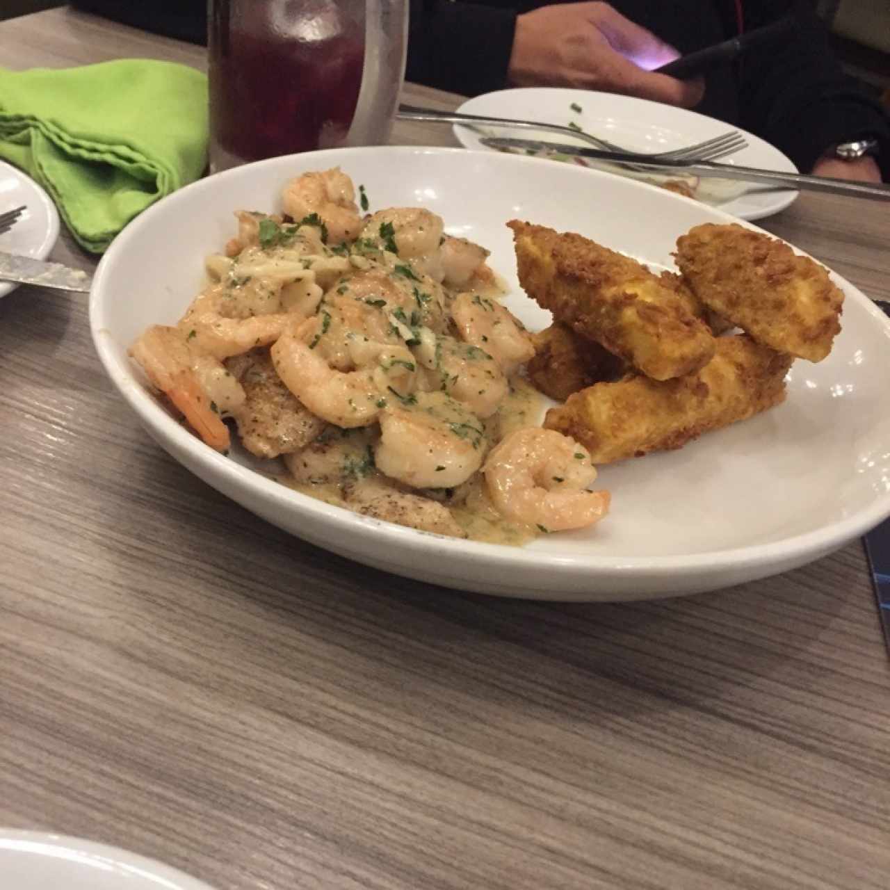corvina con mariscos