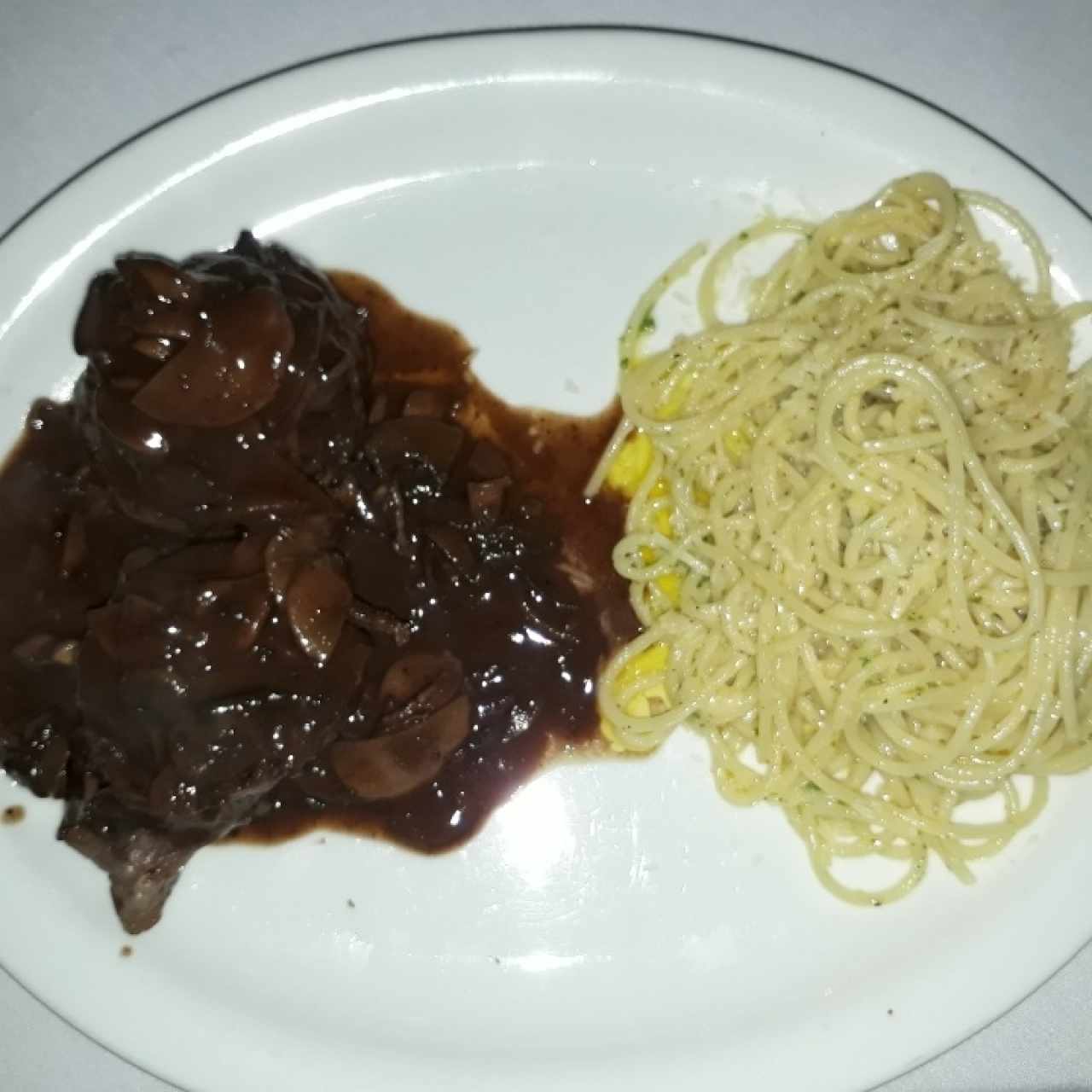 filete angus con pasta al óleo 
