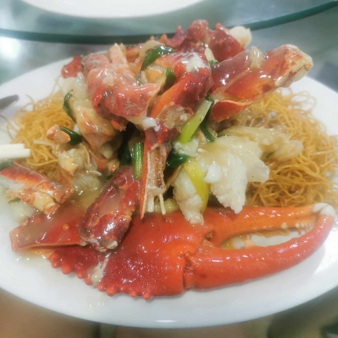 Fideos fritos con centollo en salsa de jembibre 😋👍✔️