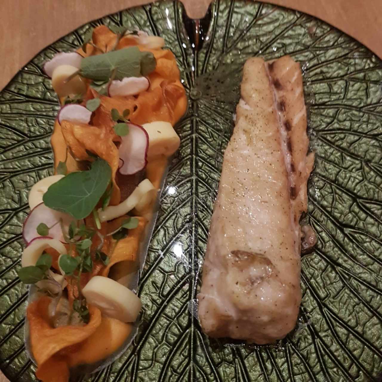 Corvina en salsa de azafrán, palmito y camote