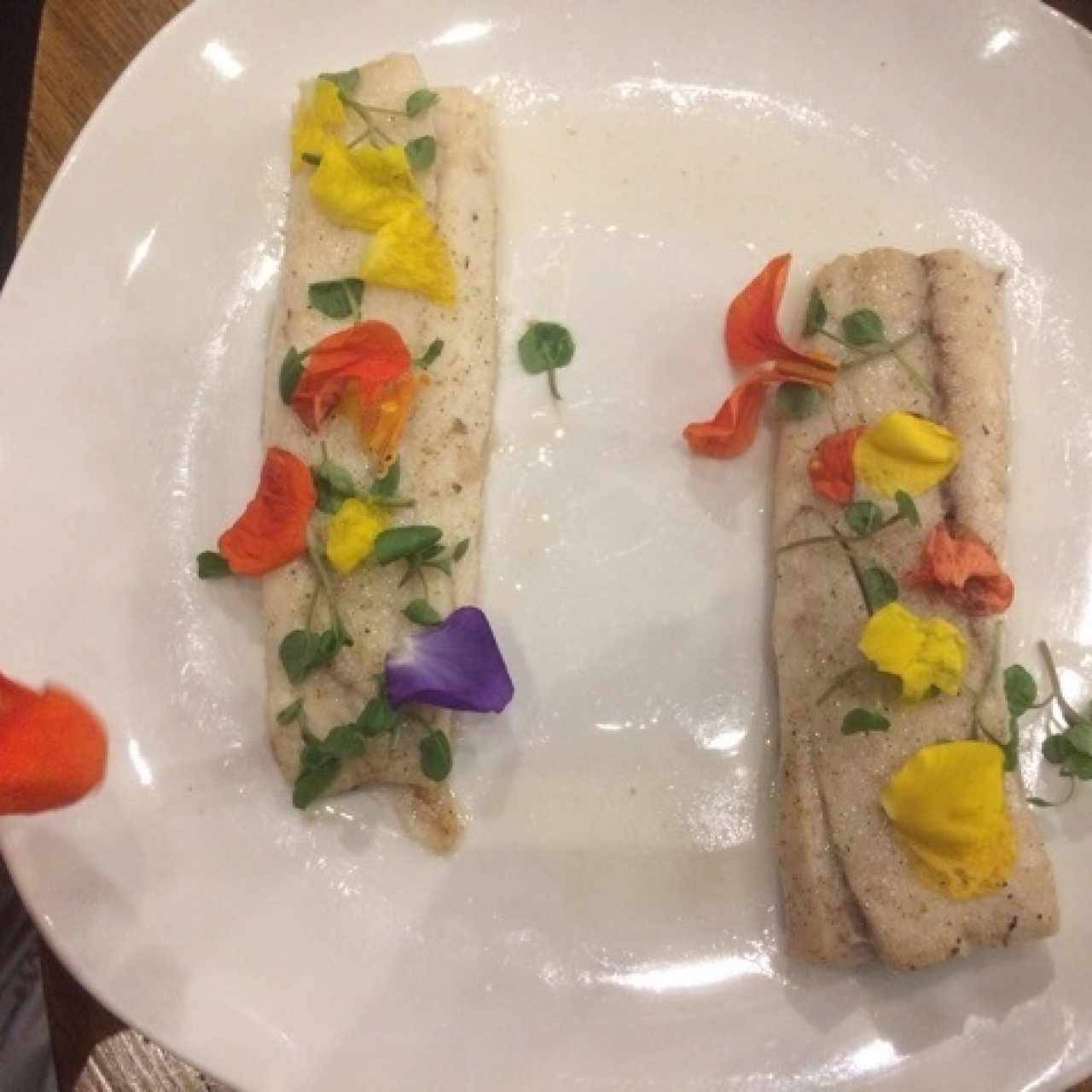Corvina en salsa de azafrán, palmito y camote