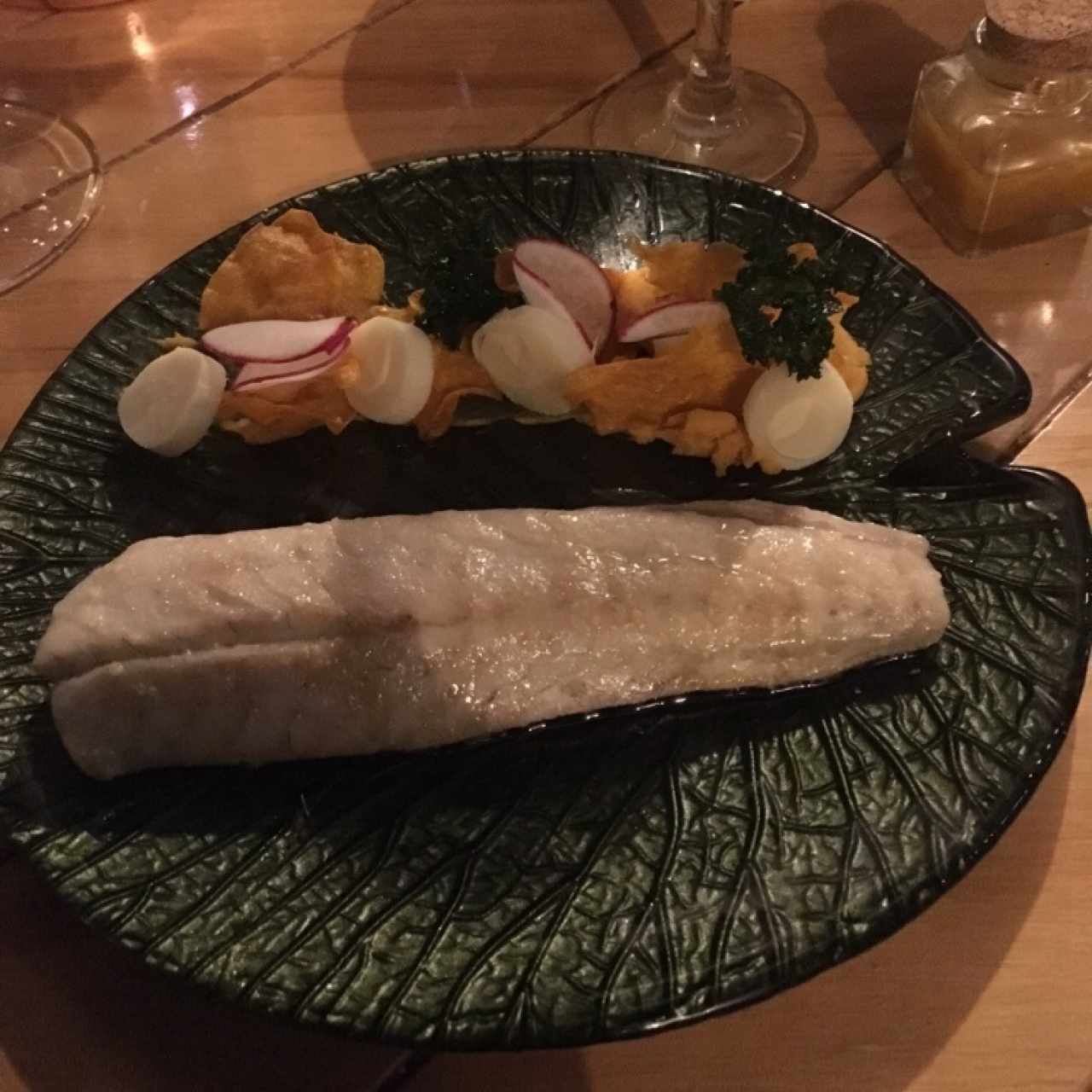 Corvina en salsa de azafrán, palmito y camote