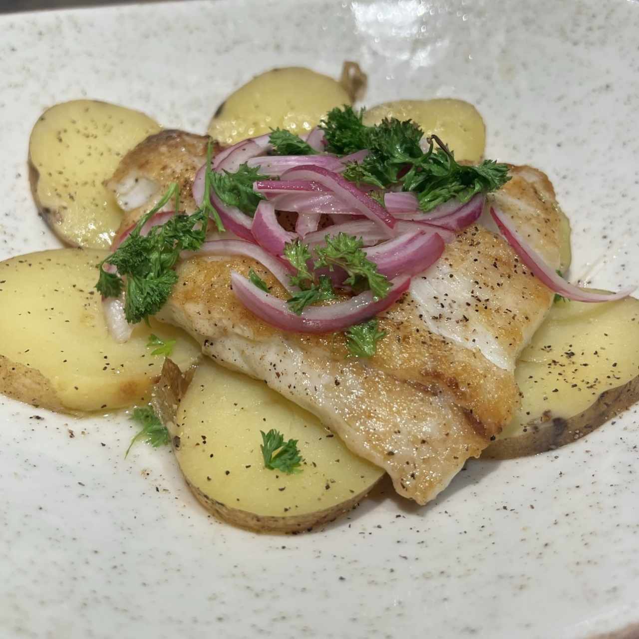 8. Corvina al Ajillo con un toque de limón
