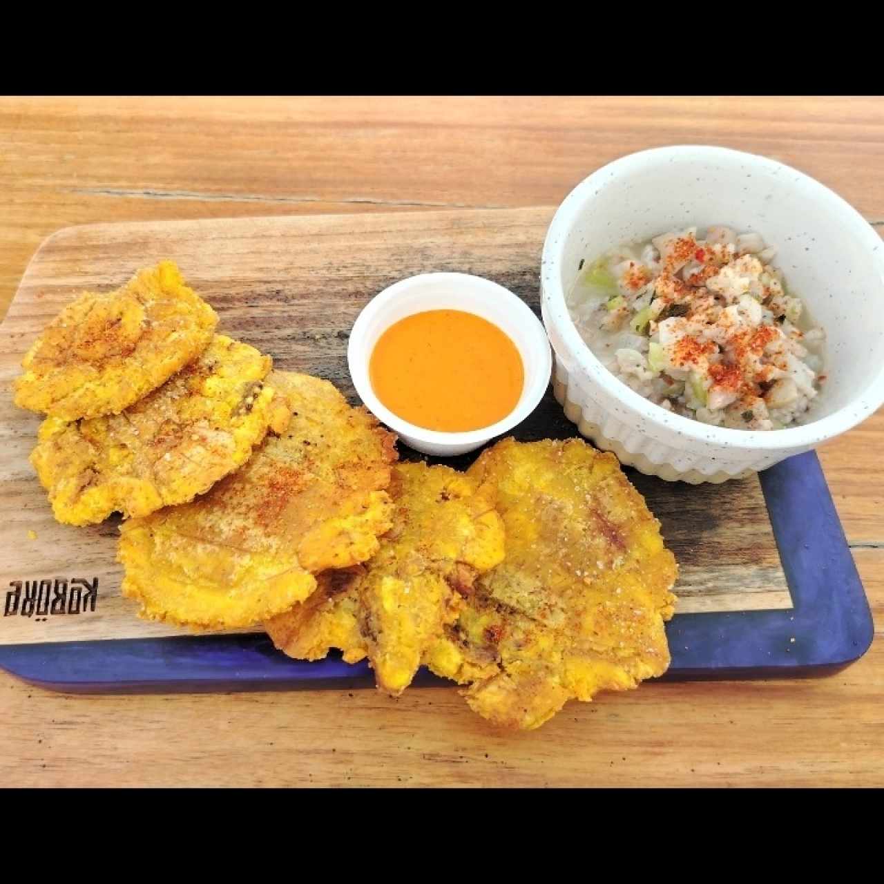 Saus picado con patacones 