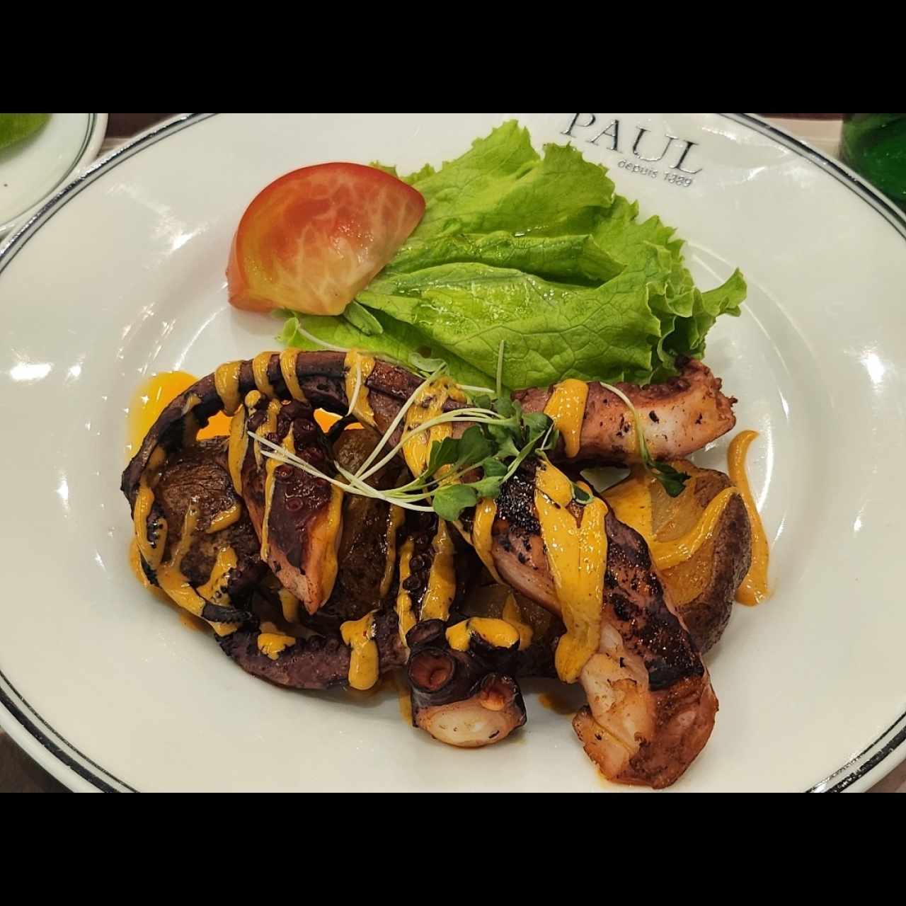 Poulpe grillé aux légumes