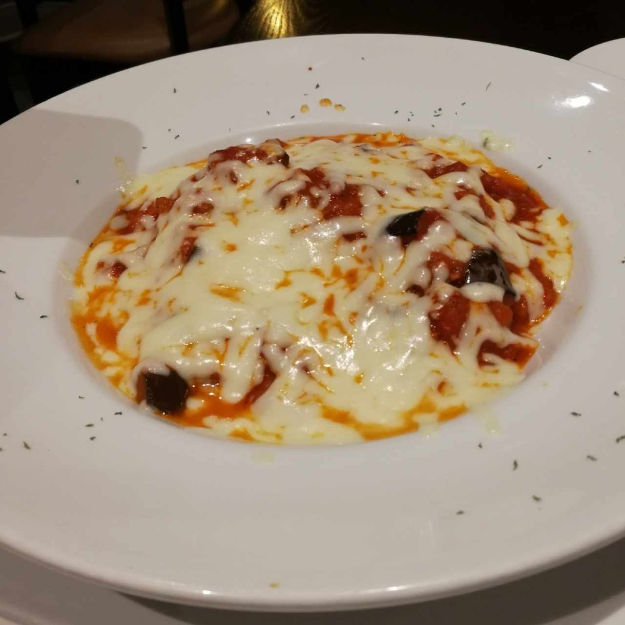 Ravioli de ricota con espinaca en salsa pomodoro