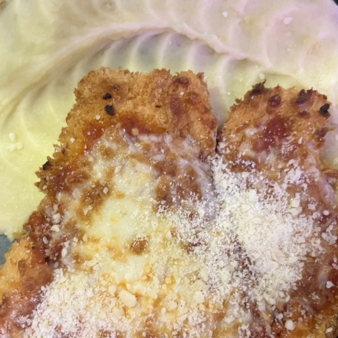 Milenanesa de Pollo parmesano con pure