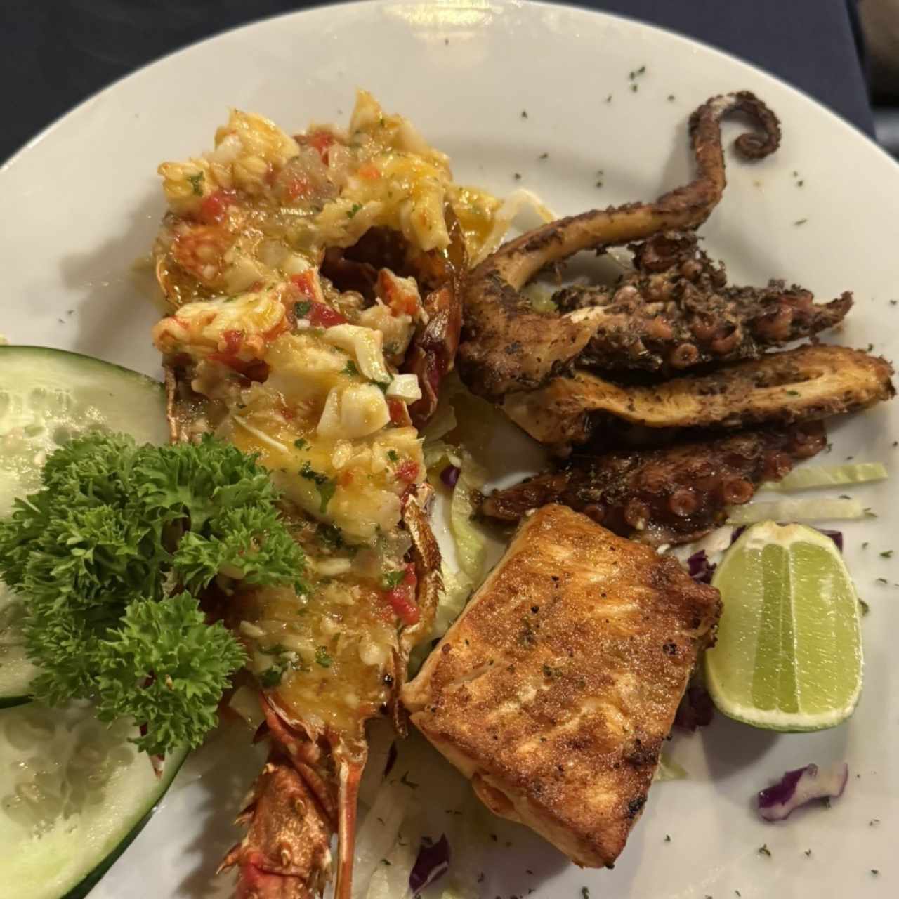Langosta, puerco y pulpo 
