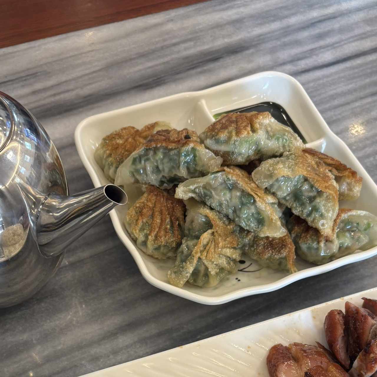 Dumpling de puerco con cebollina