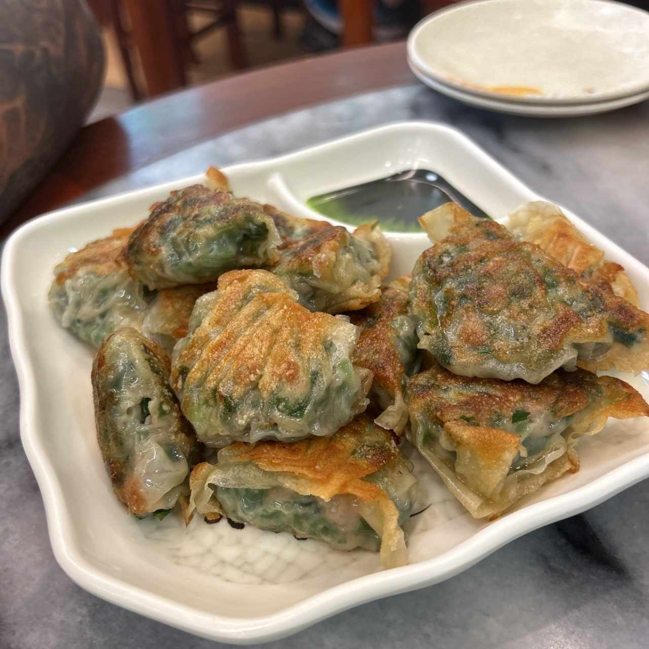 Dumpling de puerco con cebollina