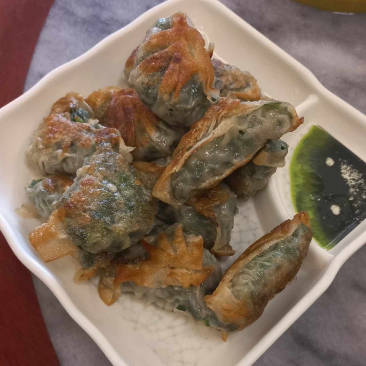 Dumpling de puerco con cebollina