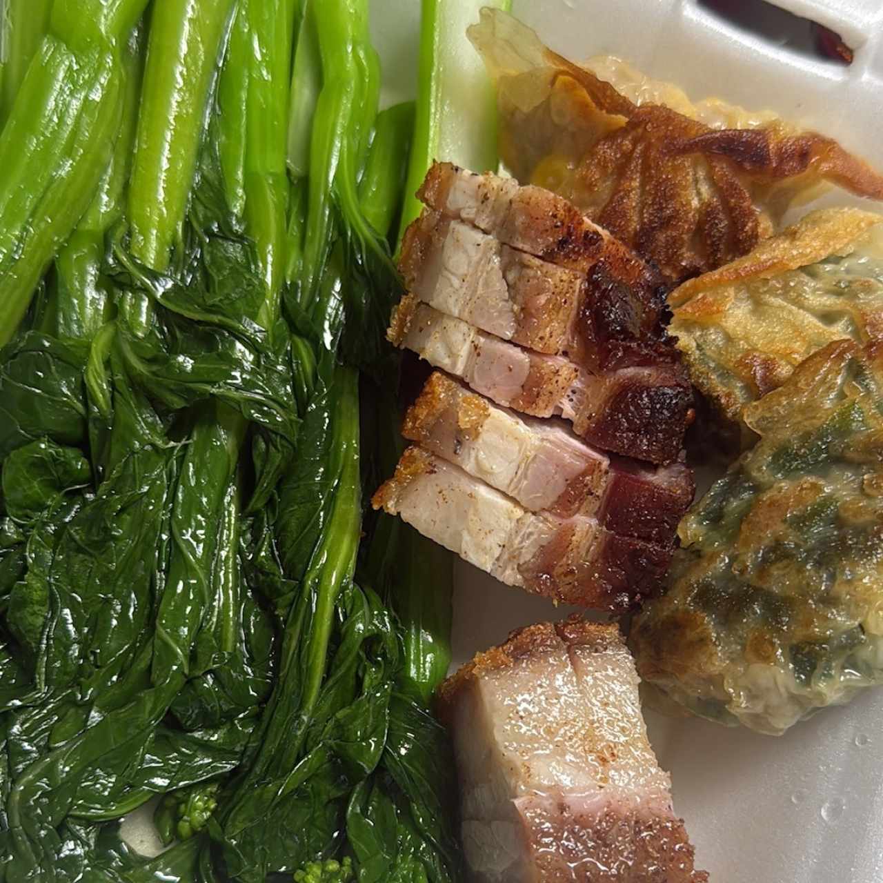 Hoja de Mostaza con Lechón 