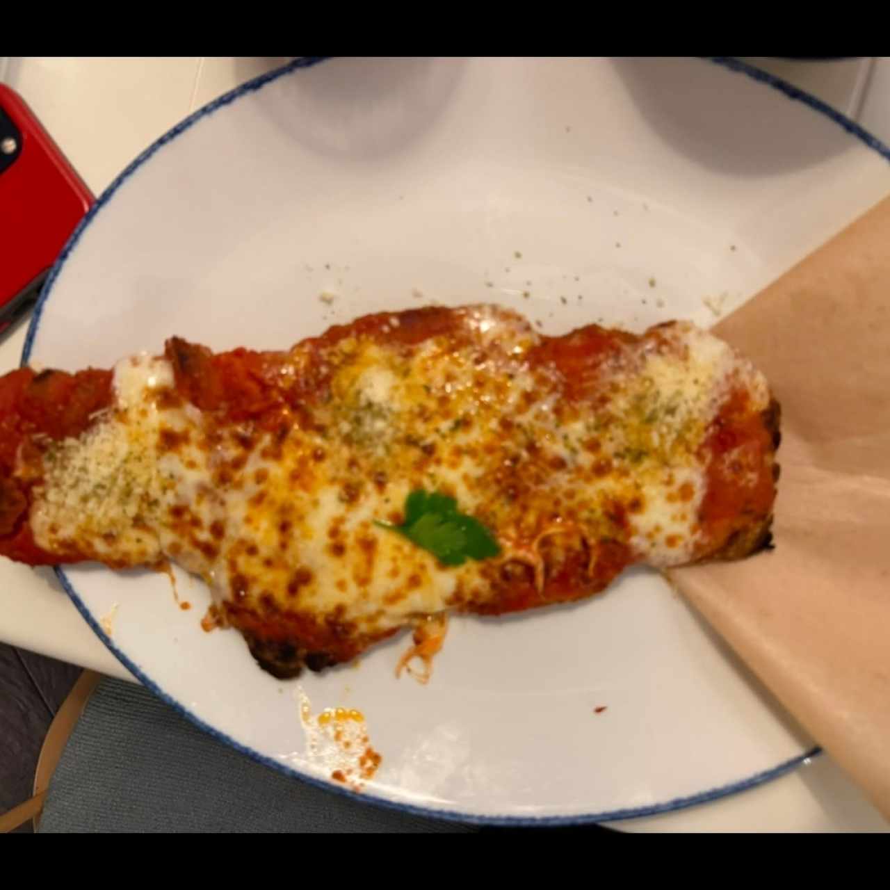 Milanesa de pollo a la parmigiana