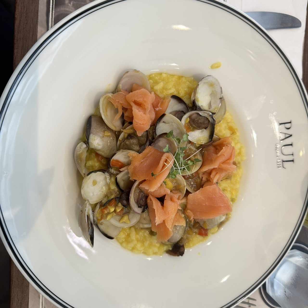 Rissotto de almejasal ajillo y salmon ahumado 