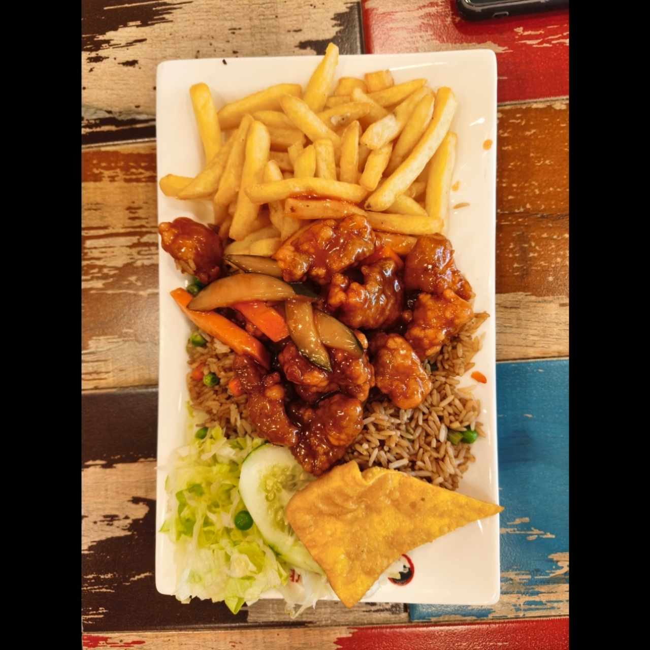 Combo 10 - Costilla Asada + arroz frito + papas fritas + ensalada + soda de lata