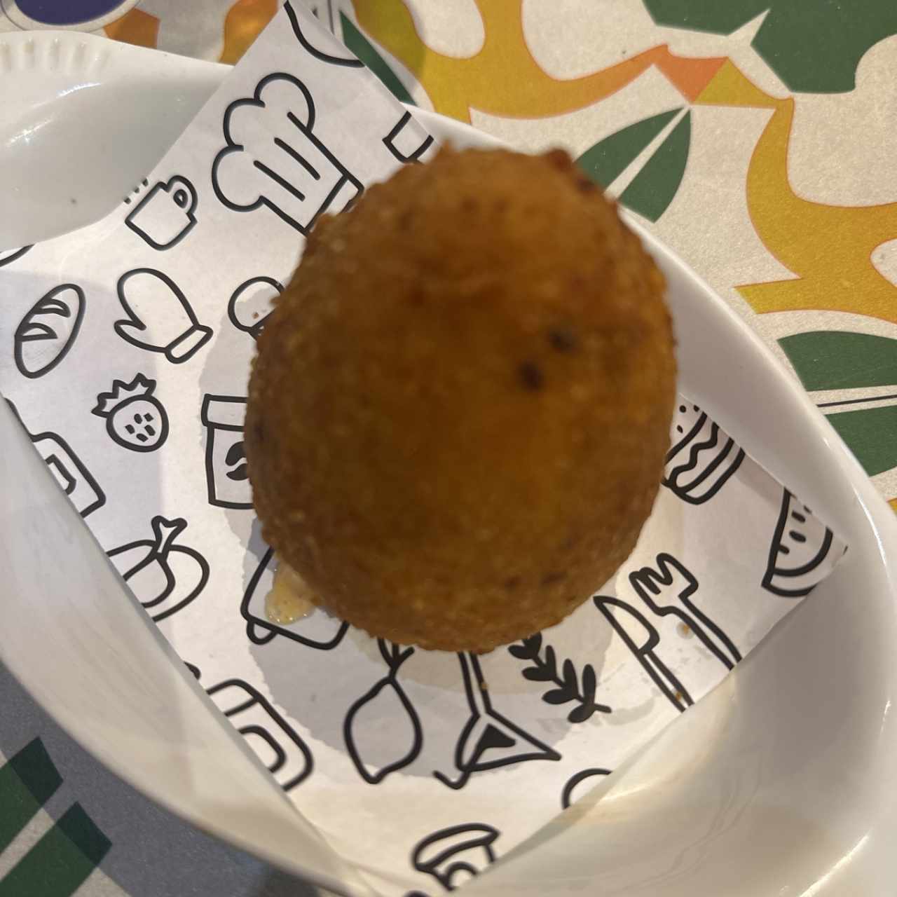 Arancino (Croquetas de arroz frito rellena)
