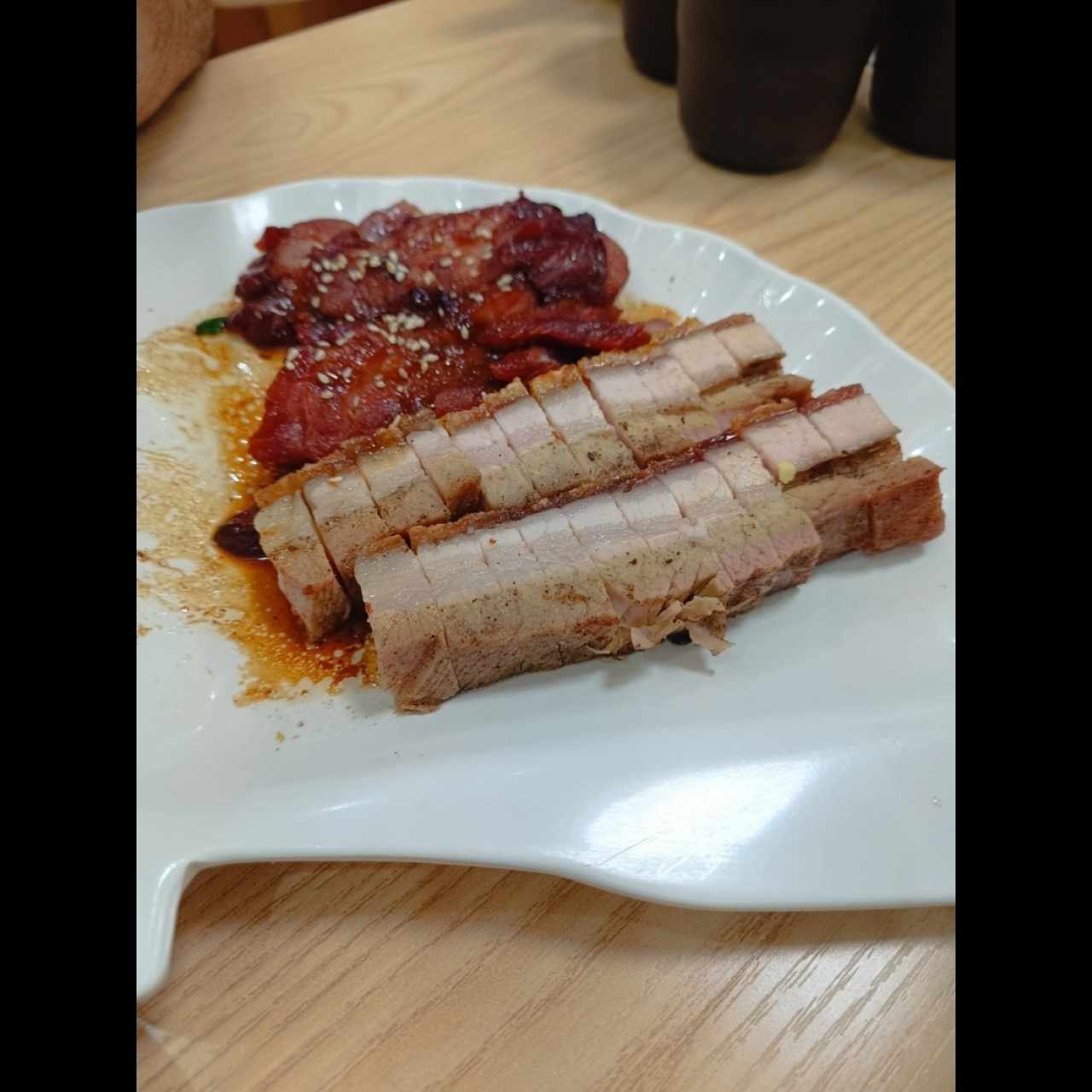 media orden de lechón asado y media orden de costillita