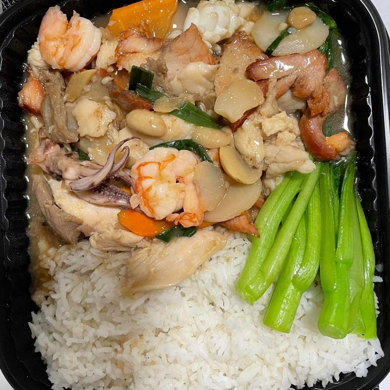 Carne con mariscos