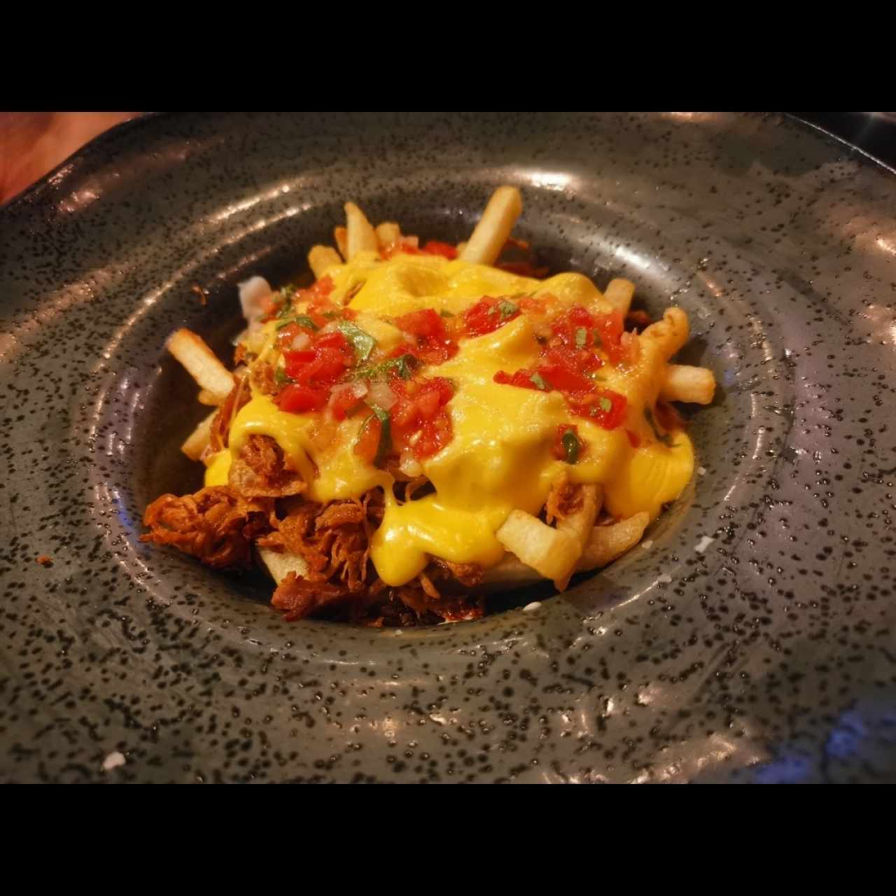 Papas trufadas con puerco