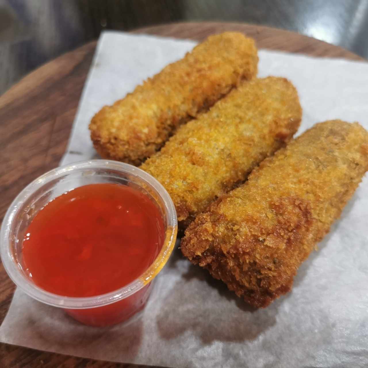 Croquetas de chorizo tableño con jalea de ají chombo 