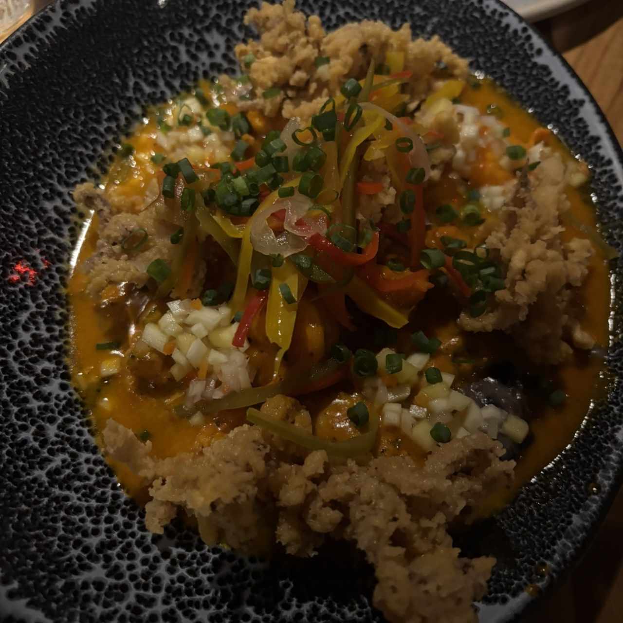 Guacho con guandú, coco y mariscos