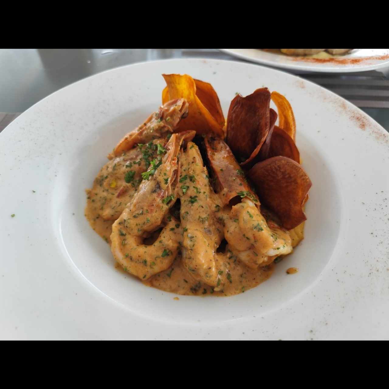 Langostinos con puré de camote 