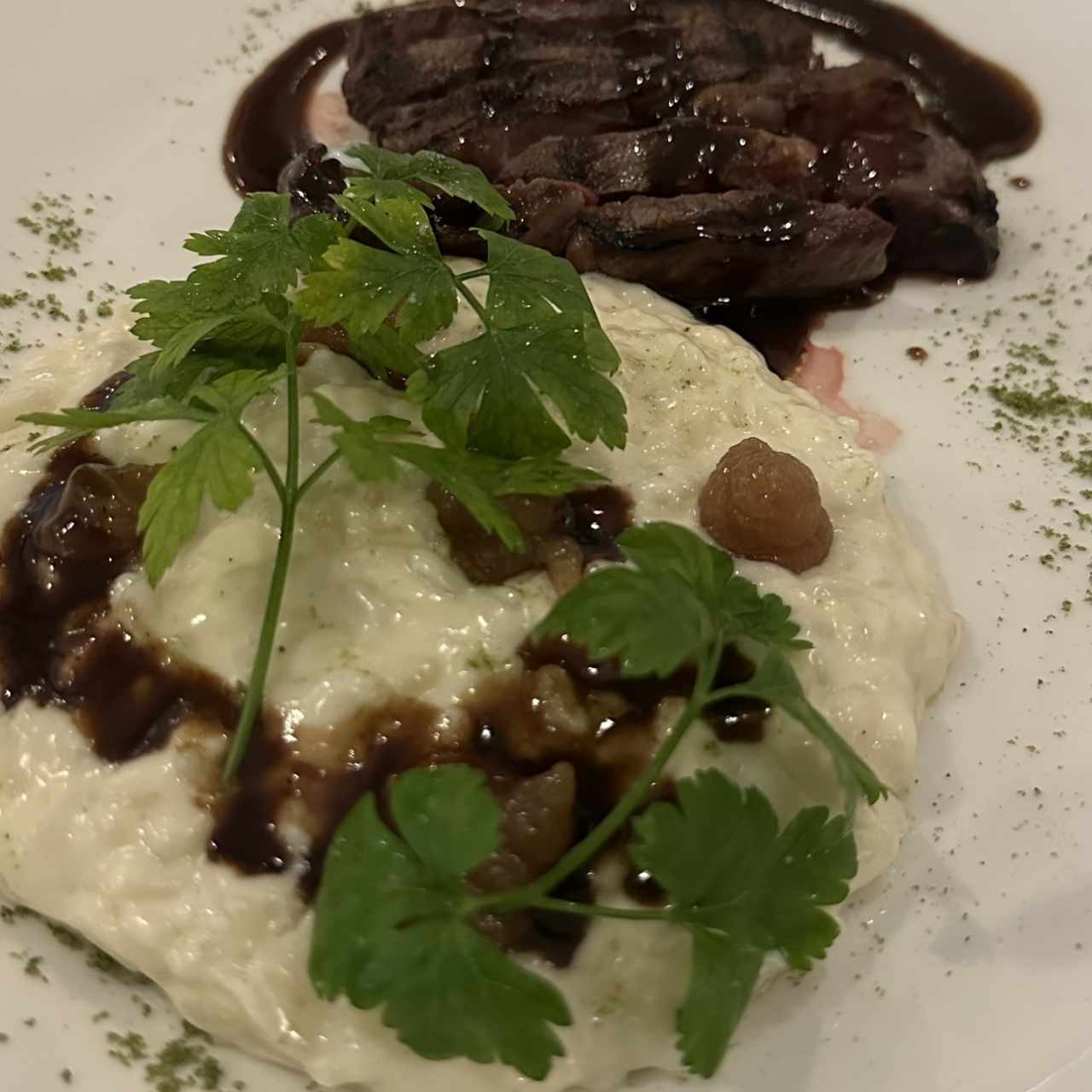 Arroz meloso de queso de cabra con rib eye
