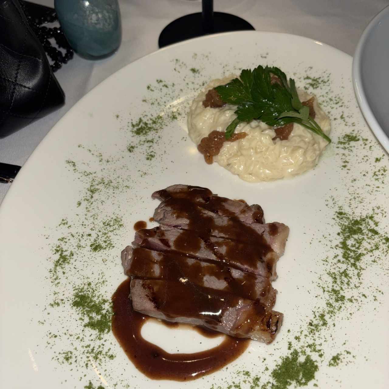 Arroz meloso de queso de cabra con rib eye