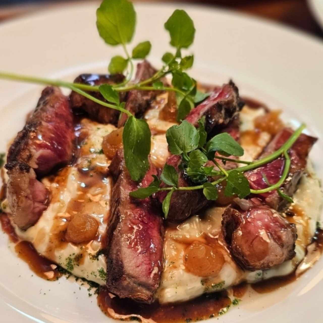 Arroz meloso de queso de cabra con rib eye