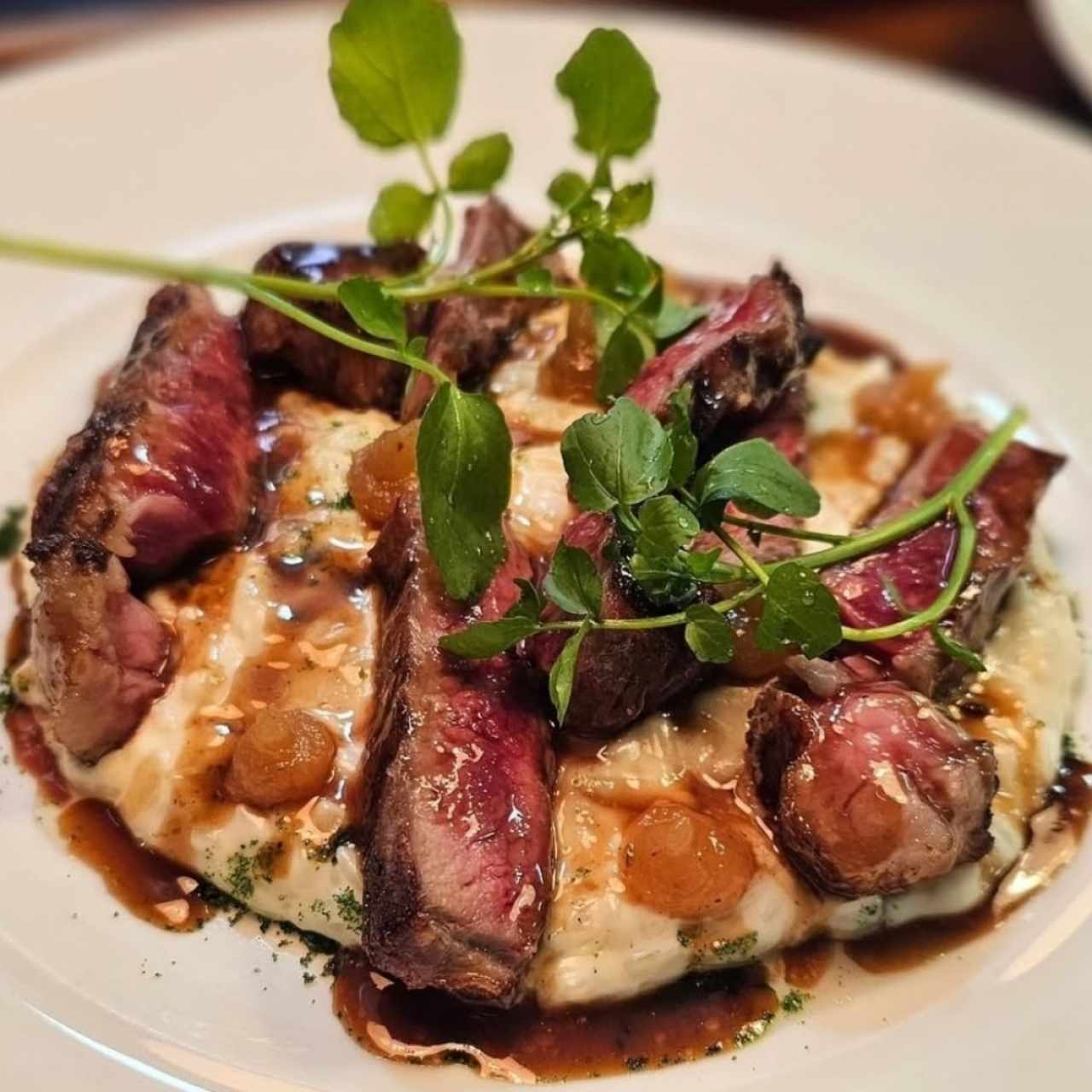 Arroz meloso de queso de cabra con rib eye