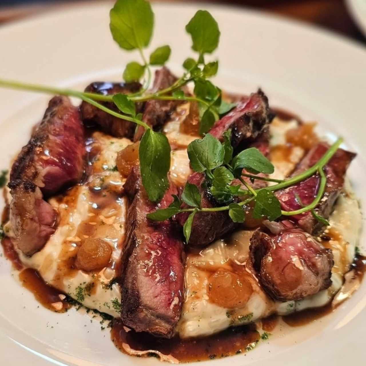 Arroz meloso de queso de cabra con rib eye