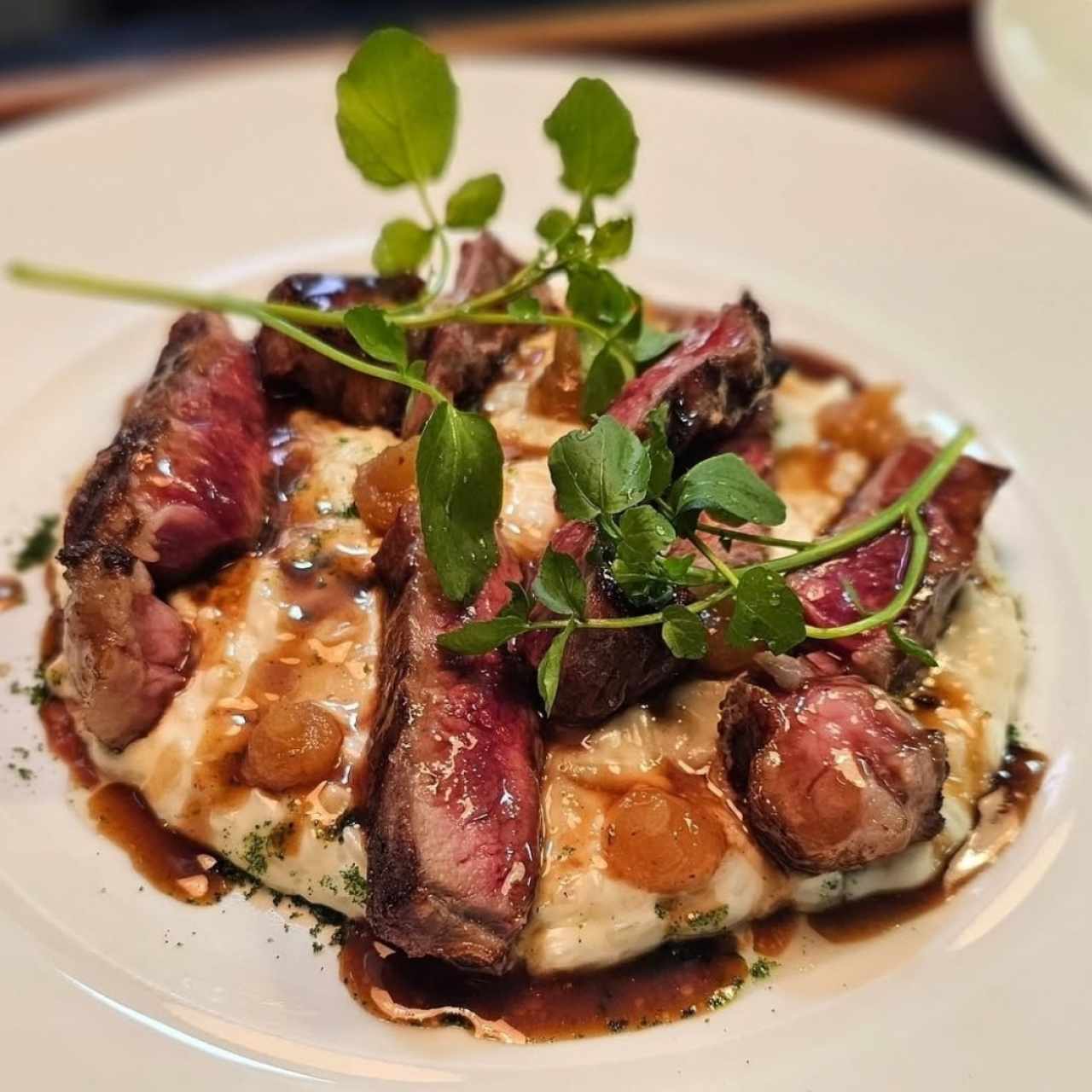 Arroz meloso de queso de cabra con rib eye