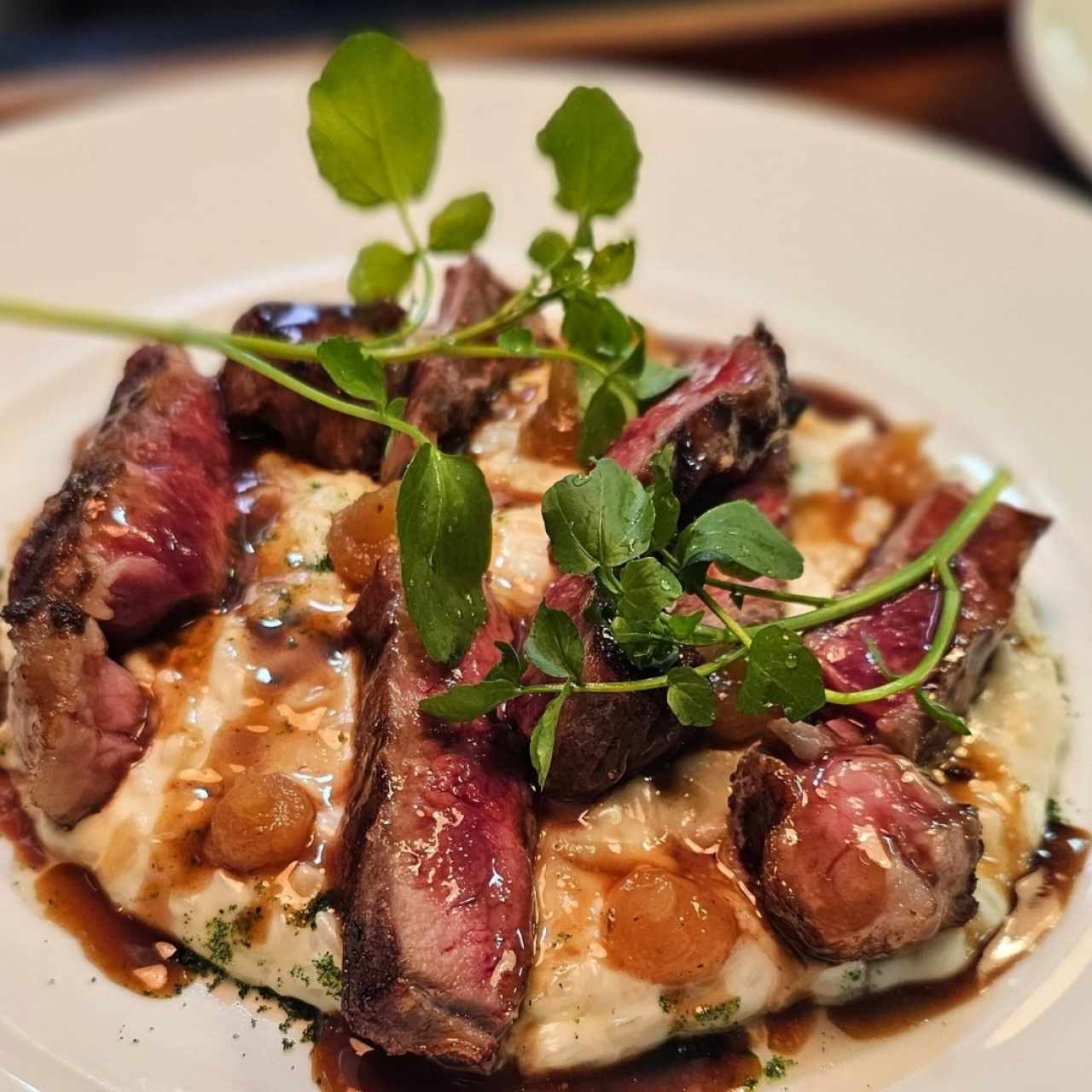 Arroz meloso de queso de cabra con rib eye
