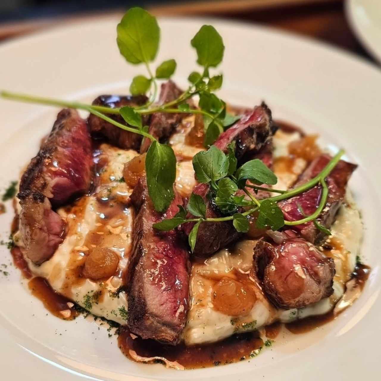 Arroz meloso de queso de cabra con rib eye
