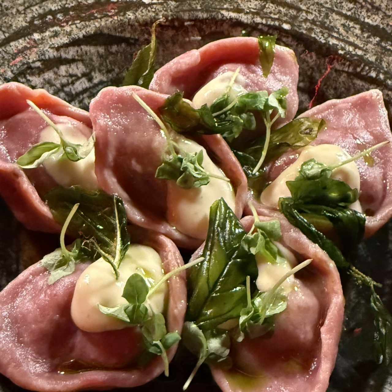 Raviolis de hongos y pulpo