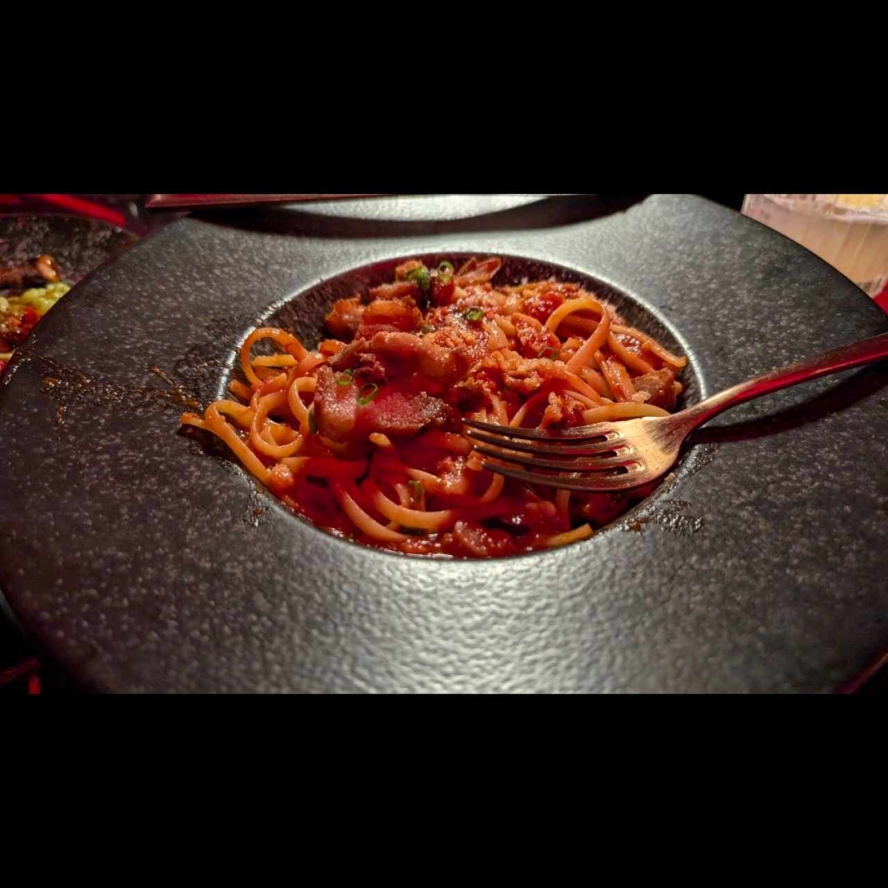 Linguini a la amatriciana con crispy pork belly
