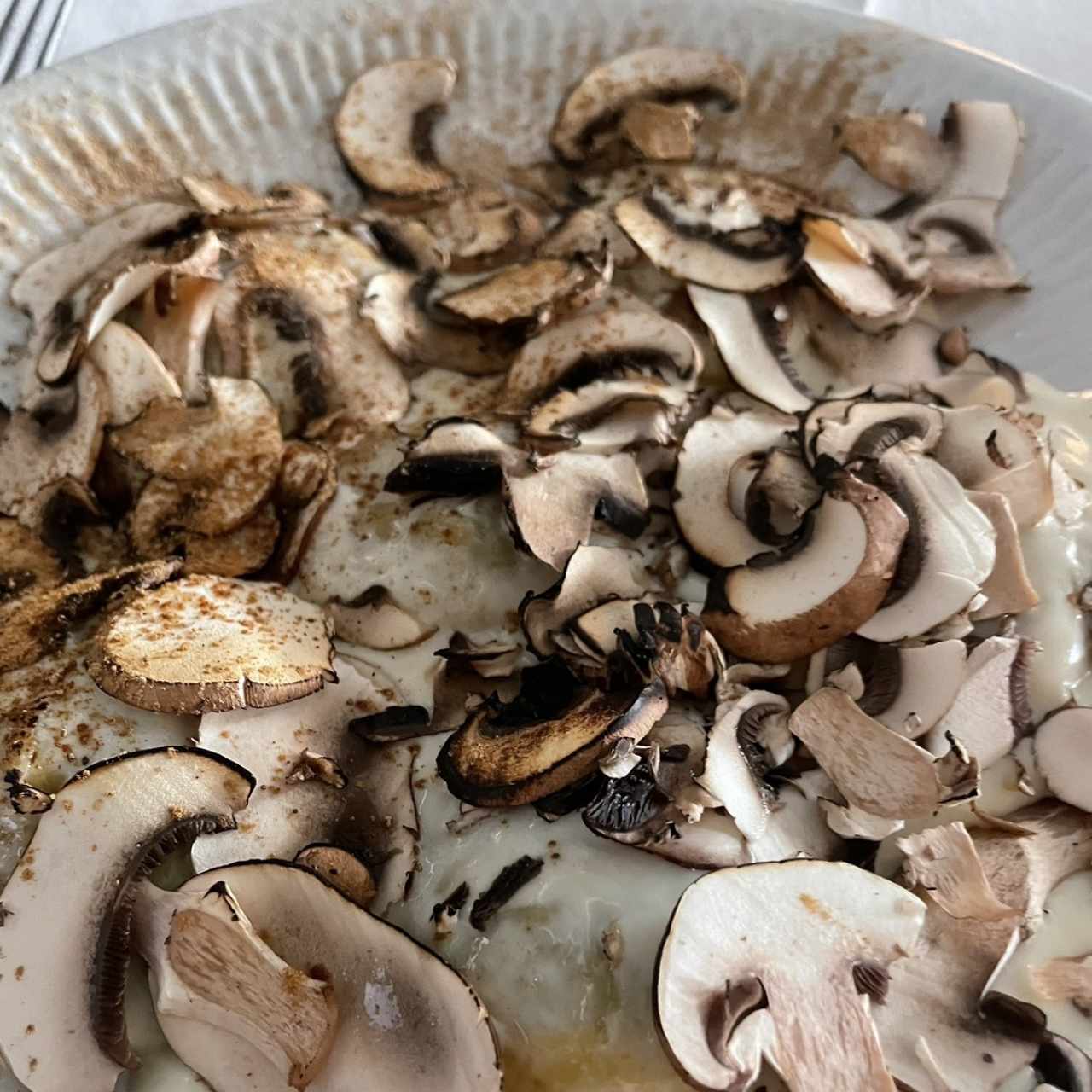 Raviolli Tondi de Hongos y Escargots
