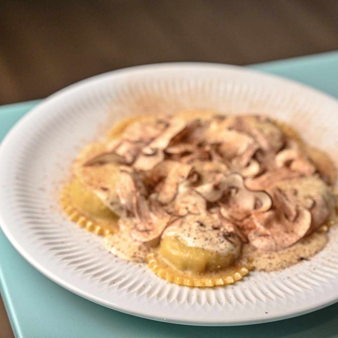 Raviolli Tondi de Hongos y Escargots