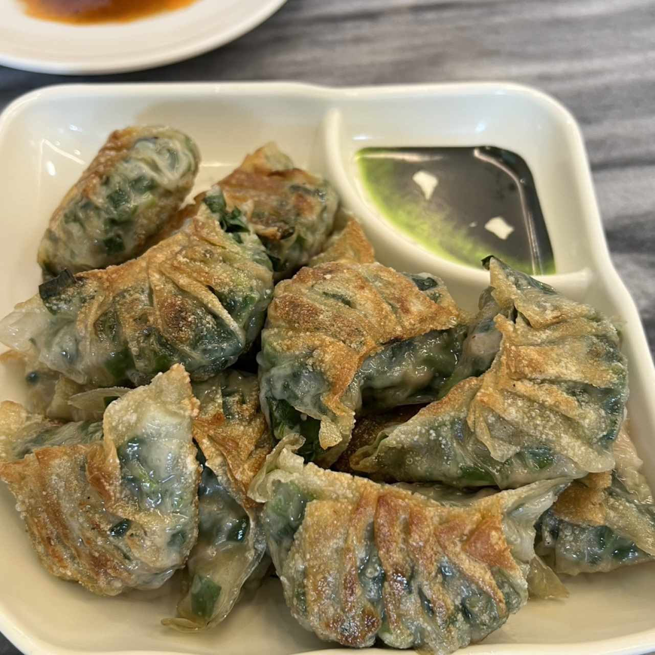 Dumpling de puerco con cebollina