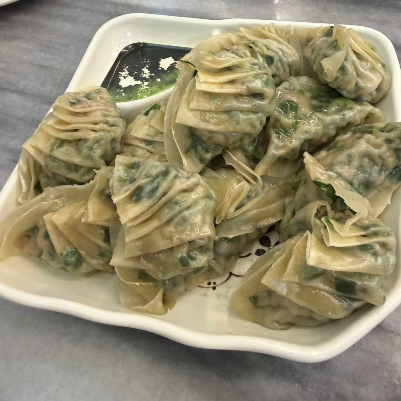 Dumpling de puerco con cebollina
