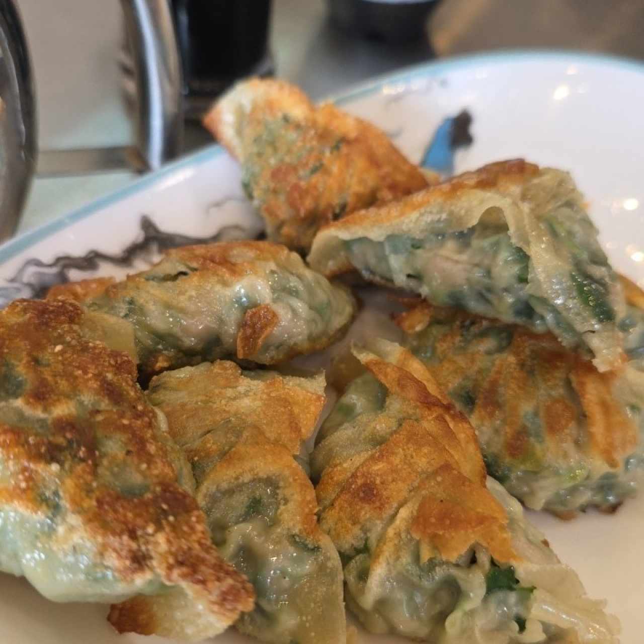 Dumpling de puerco con cebollina