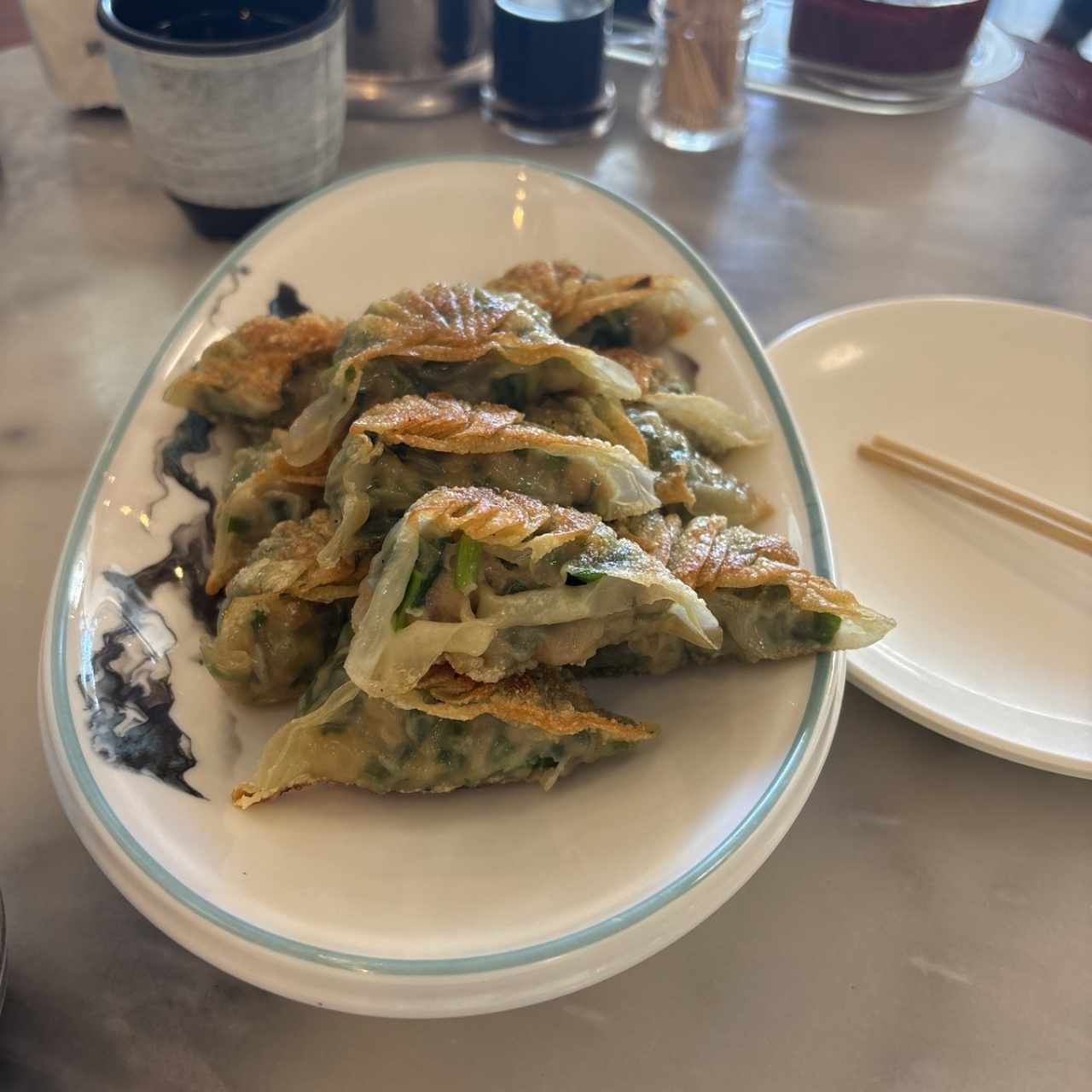 Dumpling de puerco con cebollina