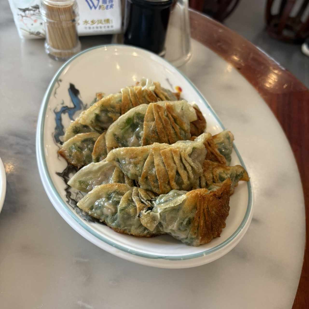 Dumpling de puerco con cebollina