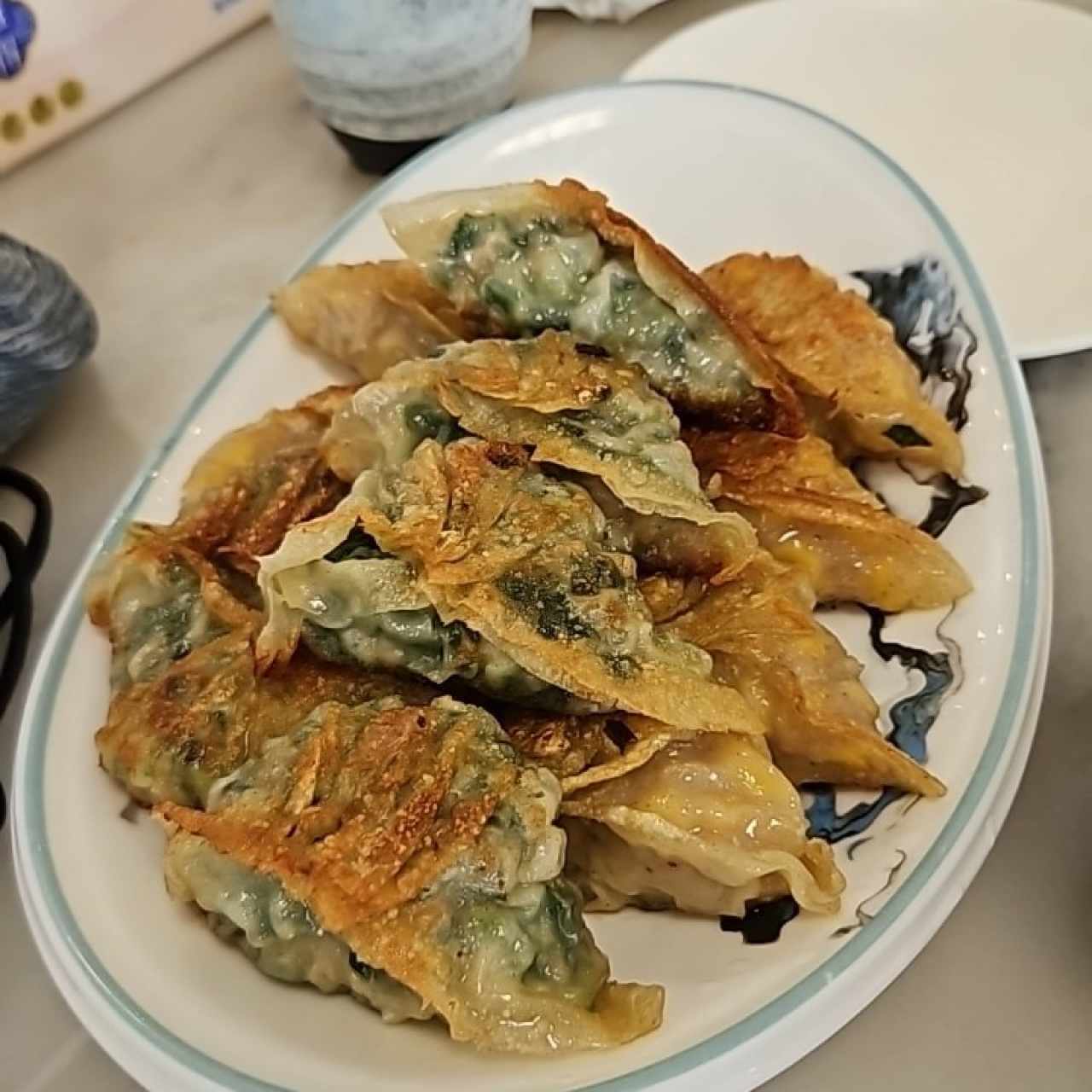 Dumpling de puerco con cebollina